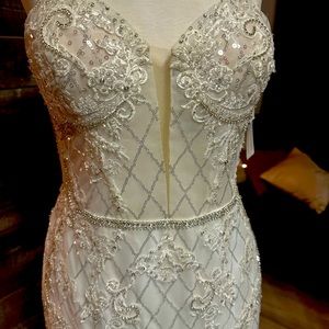 Strapless detailed patter with beads and lace mermaid dress with long train